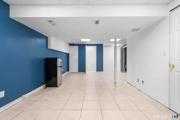 a picture of a cabinet with a white wall