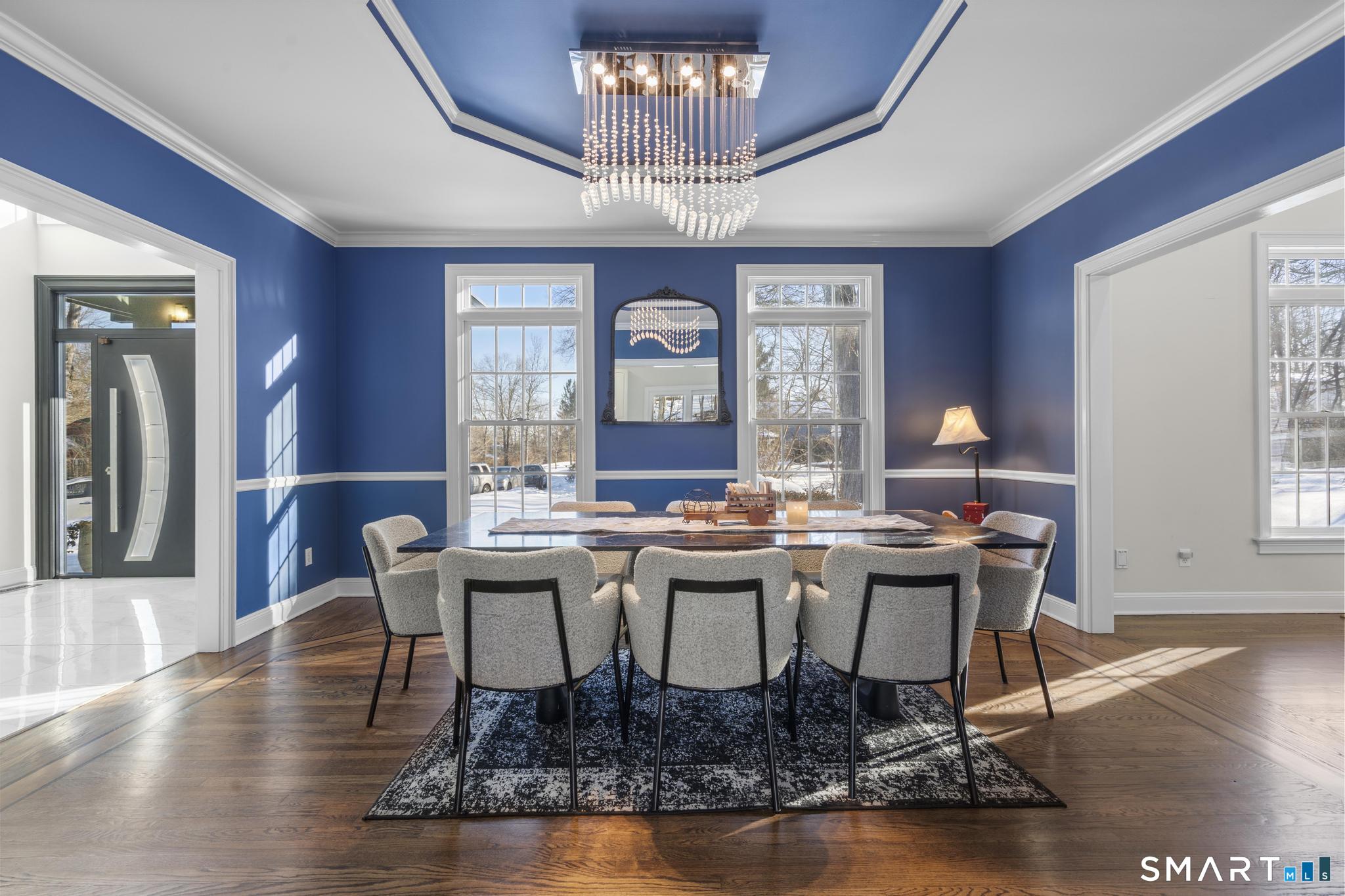 13 Surrey Lane Monroe, CT 06468 - Photo 4 of 40 a view of a dining room with furniture window and wooden floor