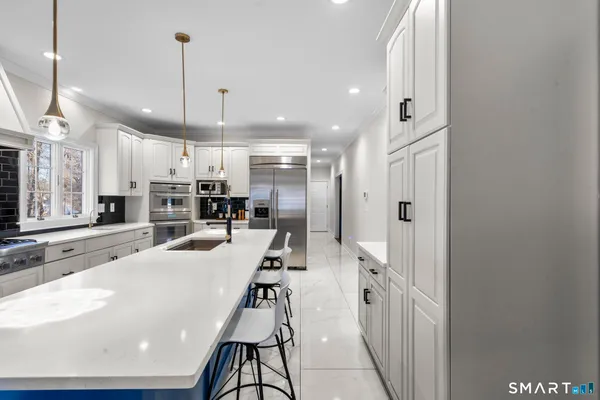 a large kitchen with a lot of counter space