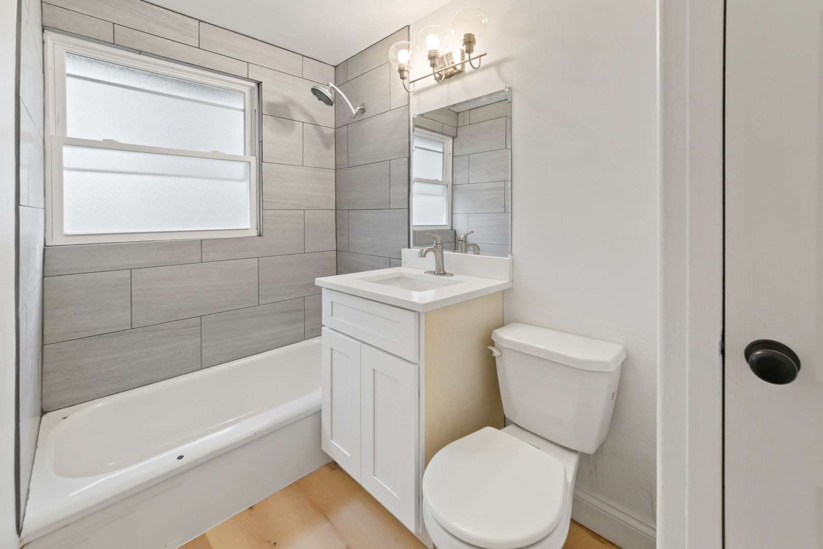 28 Dunlap Road Park Forest, IL 60466 - Photo 4 of 17 a white toilet sitting next to a bath tub