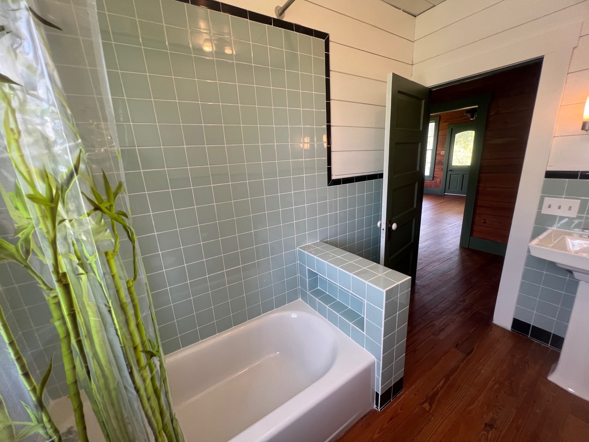 618 Bayridge Road La Porte, TX 77571 - Photo 24 of 50 Indulge in serenity with this elegant bathroom, featuring a spacious tub, shower, and soaring ceilings.