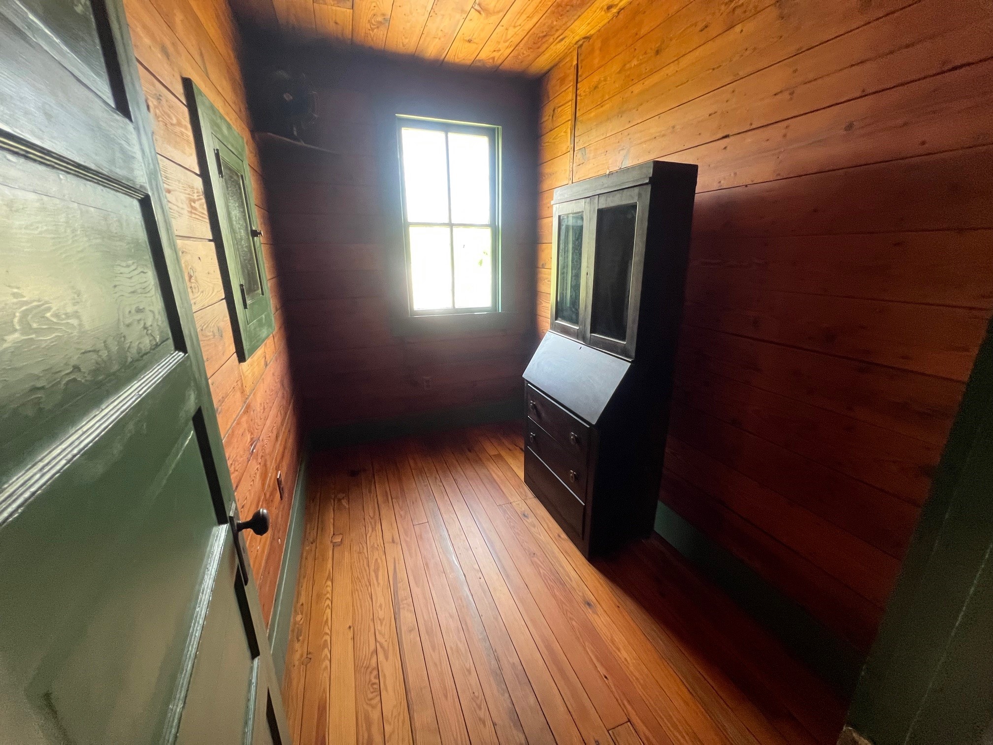 618 Bayridge Road La Porte, TX 77571 - Photo 27 of 50 a view of walk in closet with wooden floor and chair