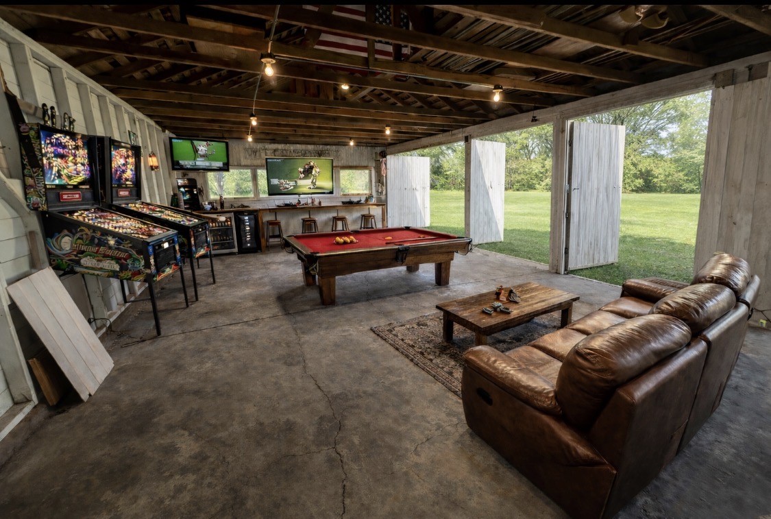 618 Bayridge Road La Porte, TX 77571 - Photo 45 of 50 a outdoor living space with furniture and a fireplace