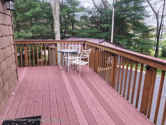 190 Jackson Mills Road Jackson, NJ 08527 - Photo 11 of 11 a view of a wooden deck with furniture
