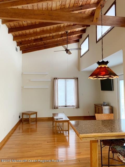 190 Jackson Mills Road Jackson, NJ 08527 - Photo 6 of 11 a kitchen with a stove a sink and a wooden cabinets