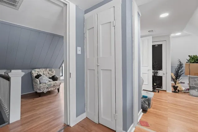 a view of a bedroom walk in closet and bedroom