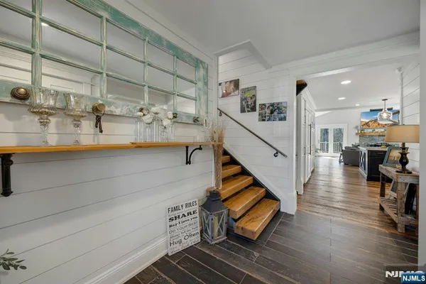 a view of a kitchen with a sink and cabinets