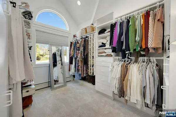 a view of a kitchen with a stove cabinets and wooden floor