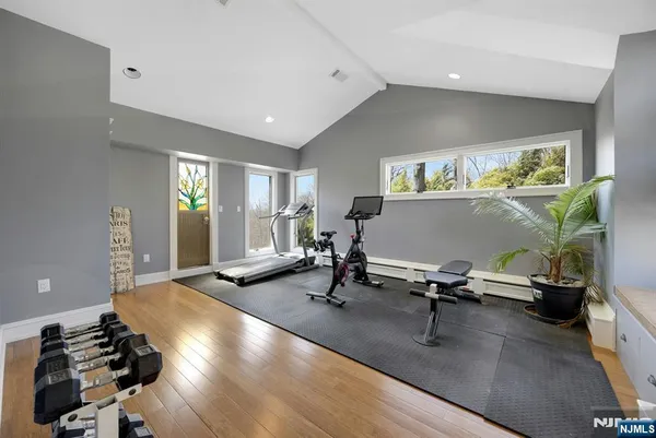 a view of a swimming pool with a yard