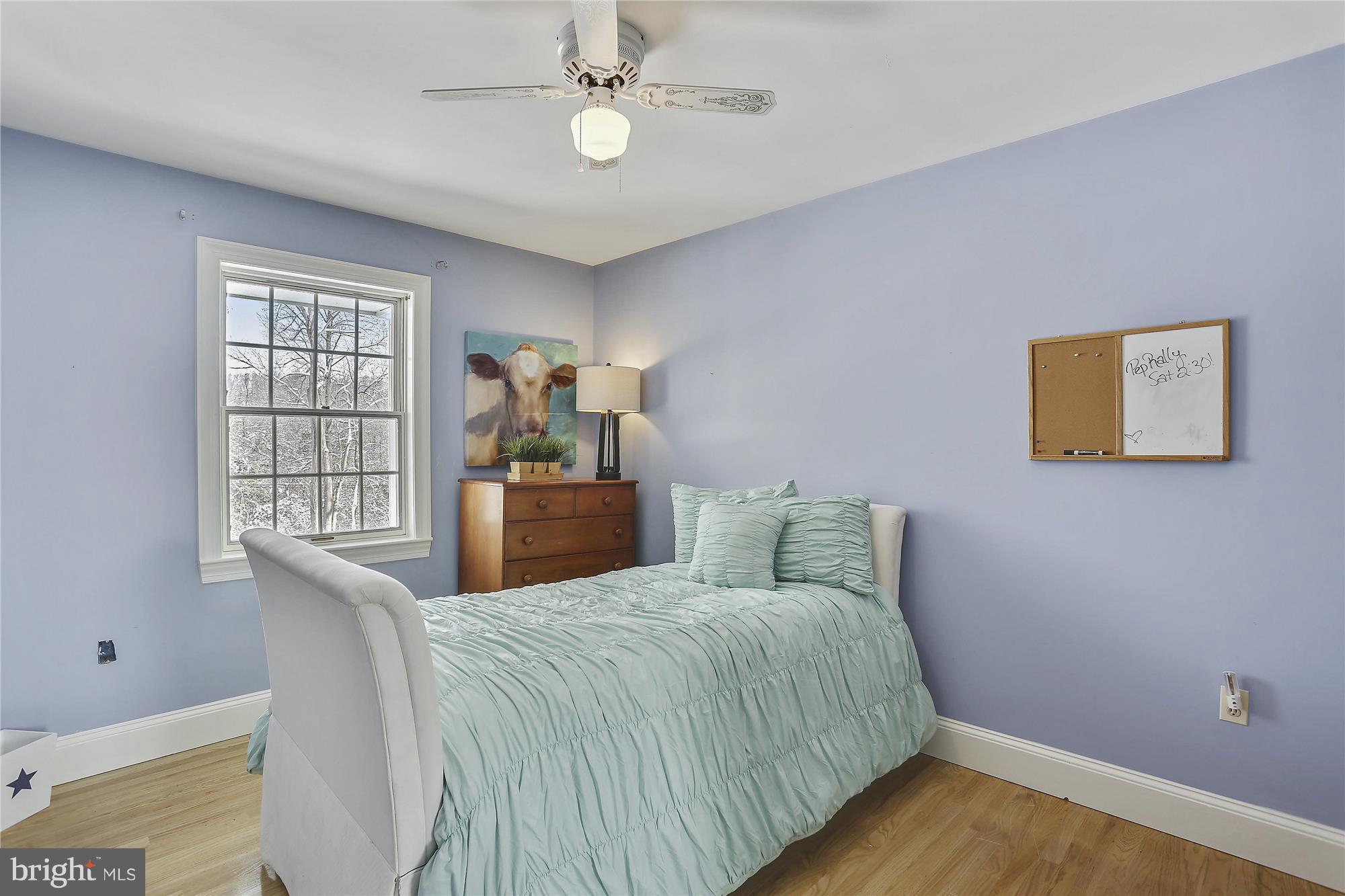 1711 Ashton Road Ashton, MD 20861 - Photo 15 of 30 a bedroom with a large bed and a window
