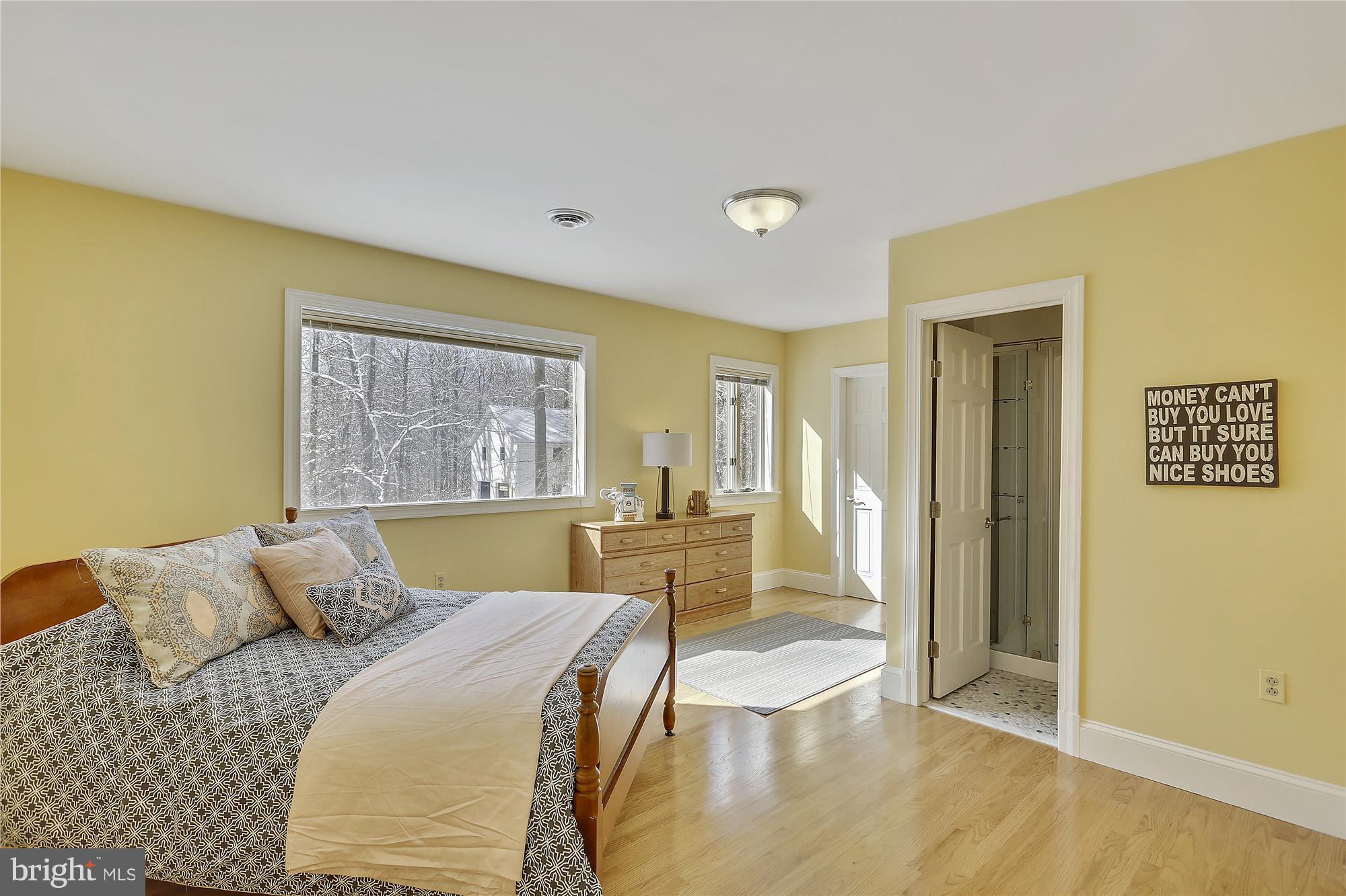 1711 Ashton Road Ashton, MD 20861 - Photo 17 of 30 a bedroom with a large bed and a window