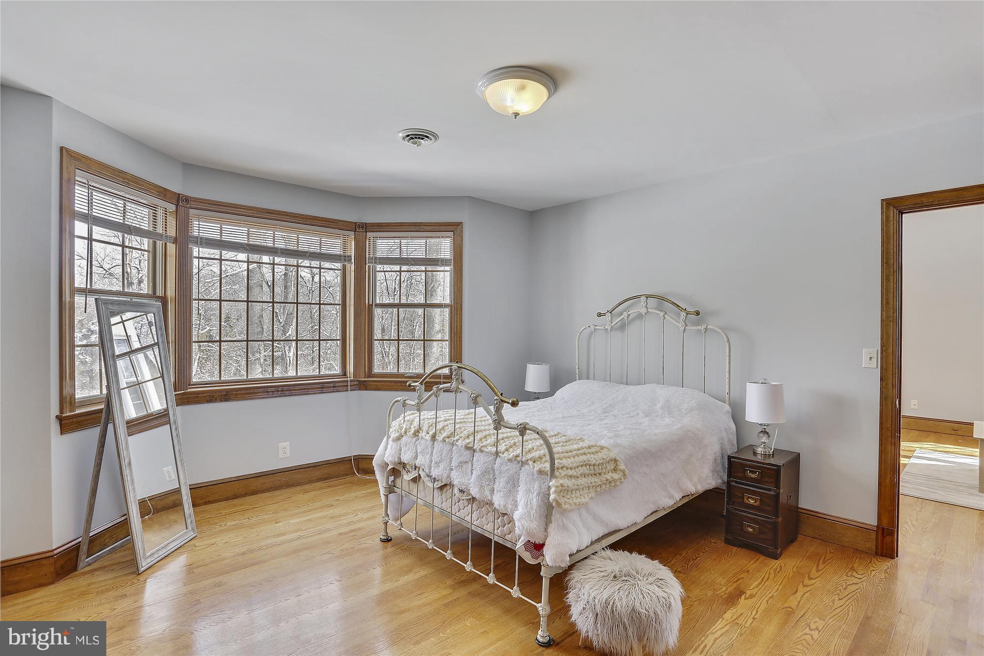 1711 Ashton Road Ashton, MD 20861 - Photo 18 of 30 a bedroom with a bed and a window