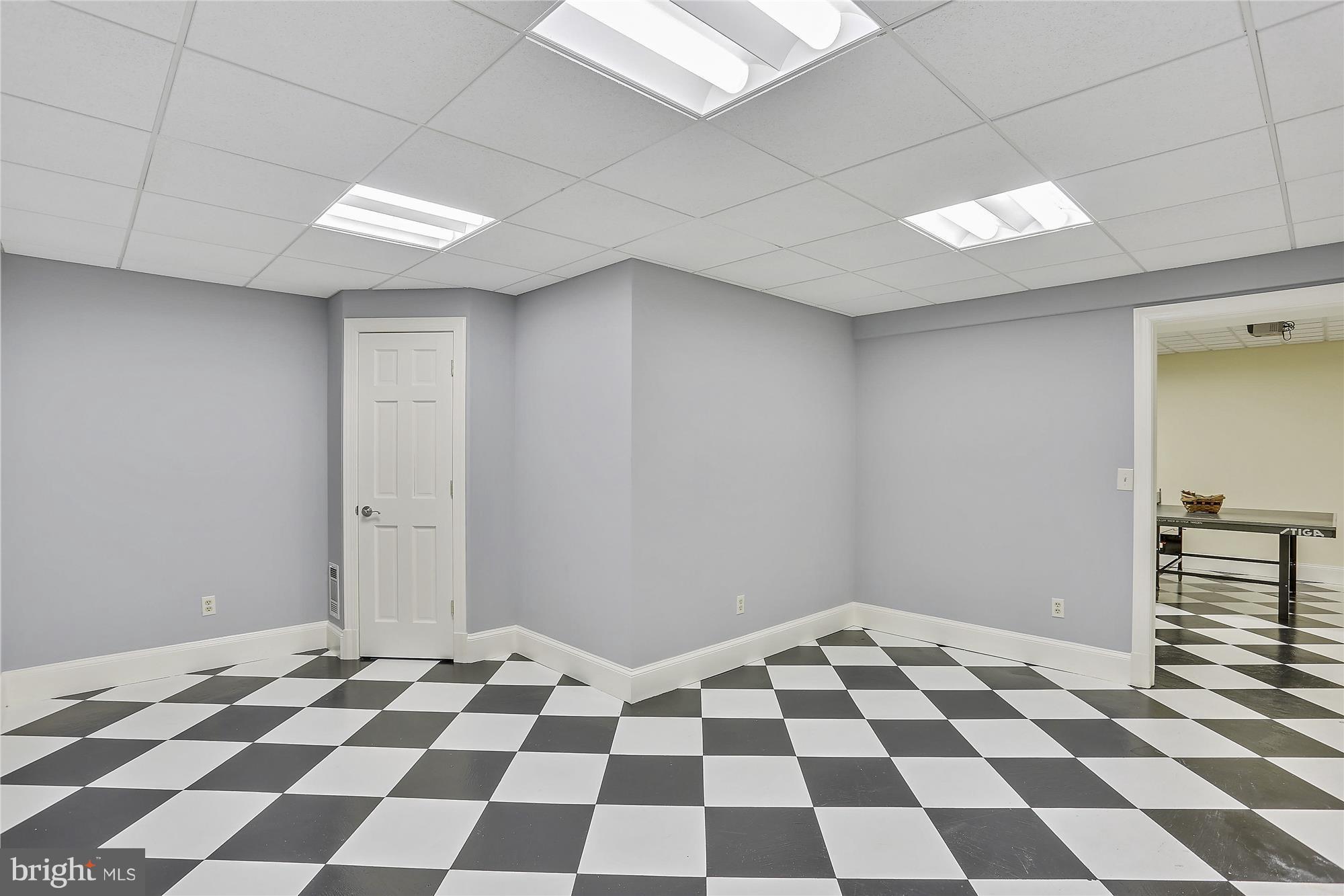 1711 Ashton Road Ashton, MD 20861 - Photo 25 of 30 a black and white checkered floor