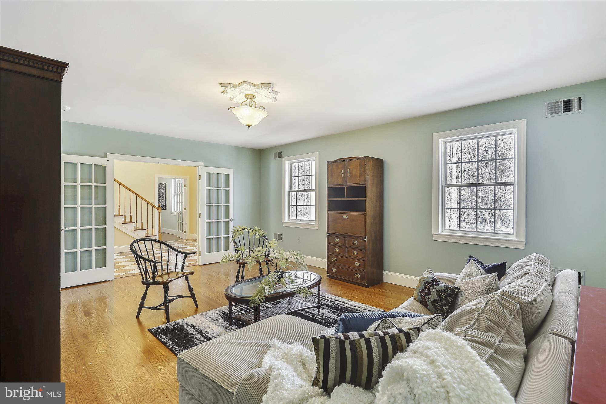 1711 Ashton Road Ashton, MD 20861 - Photo 4 of 30 a living room with furniture and two windows