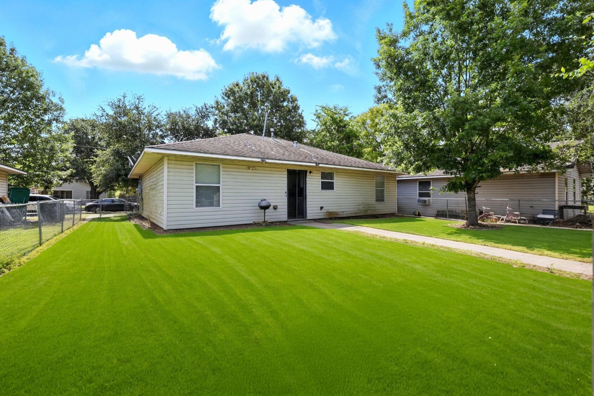 a front view of house with yard and seating area