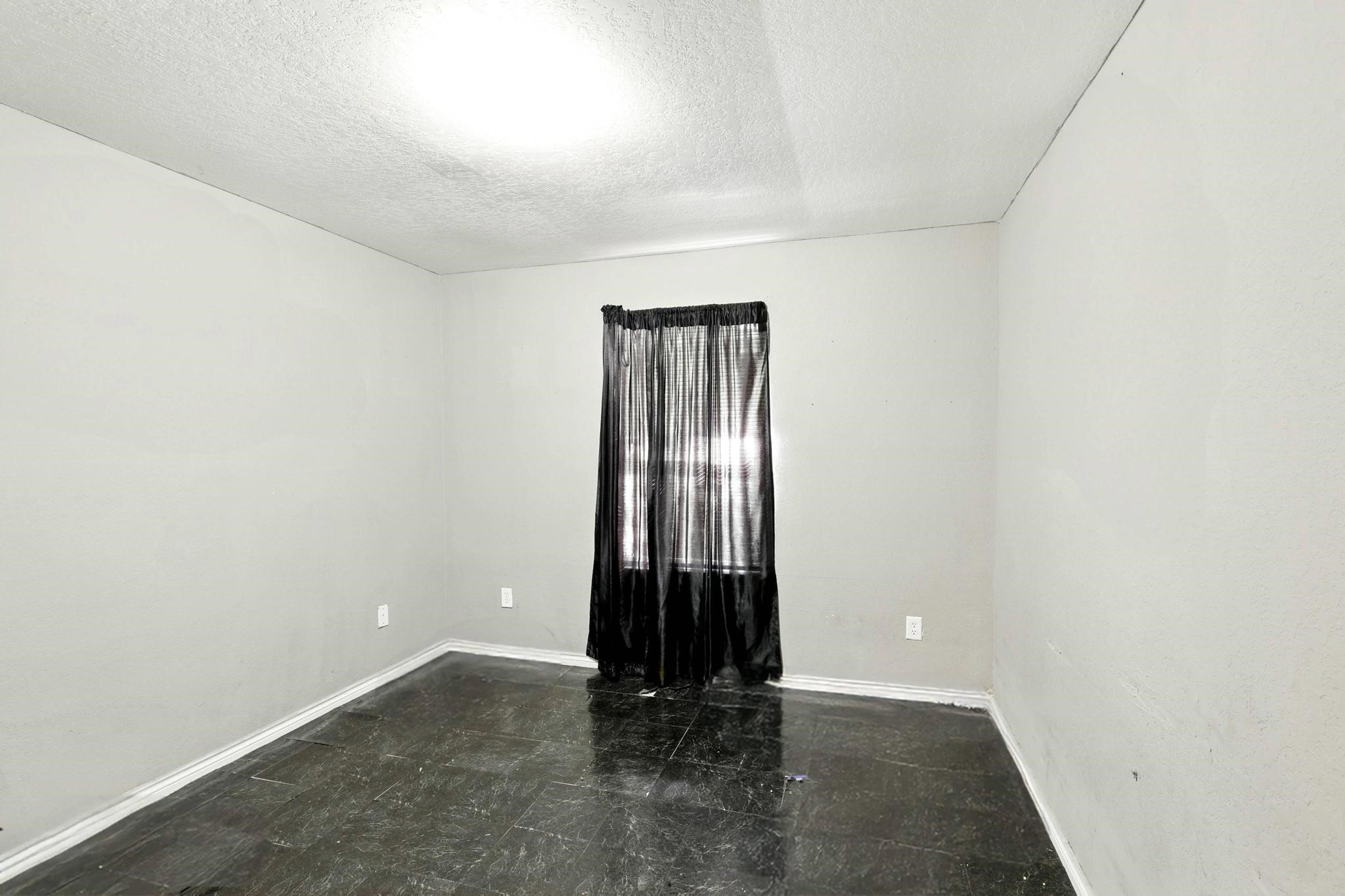 2005 Worms Street Houston, TX 77020 - Photo 7 of 11 an empty room with an entryway