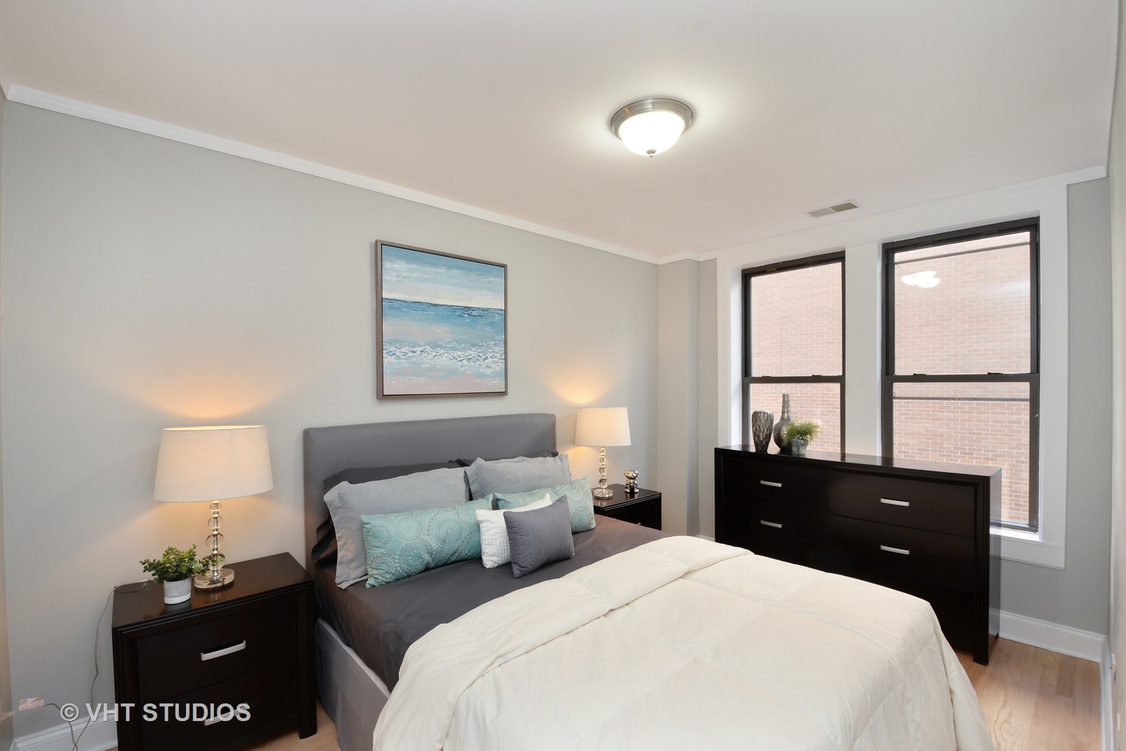 4144 North Sheridan Road, Unit 311 Chicago, IL 60613 - Photo 7 of 10 a bedroom with bed and a window