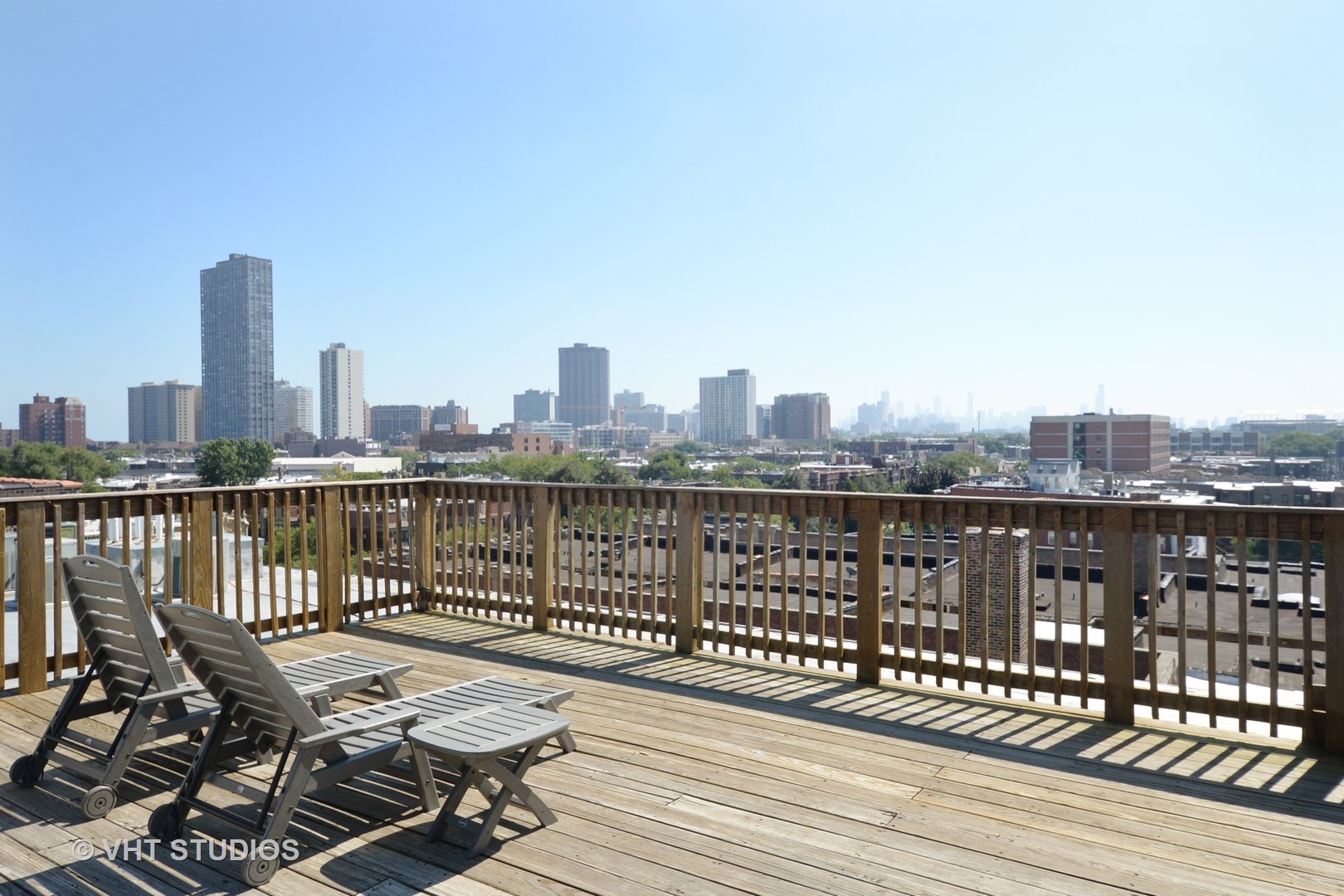 4144 North Sheridan Road, Unit 311 Chicago, IL 60613 - Photo 10 of 10 a view of a balcony with wooden floor