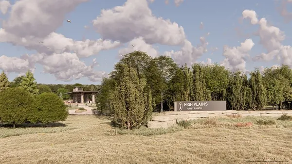 a view of a yard covered in snow