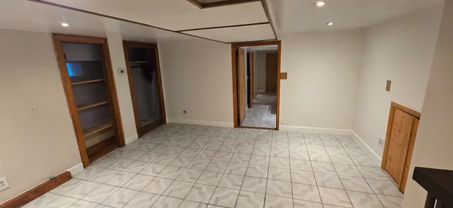 a kitchen with stainless steel appliances a refrigerator and a stove