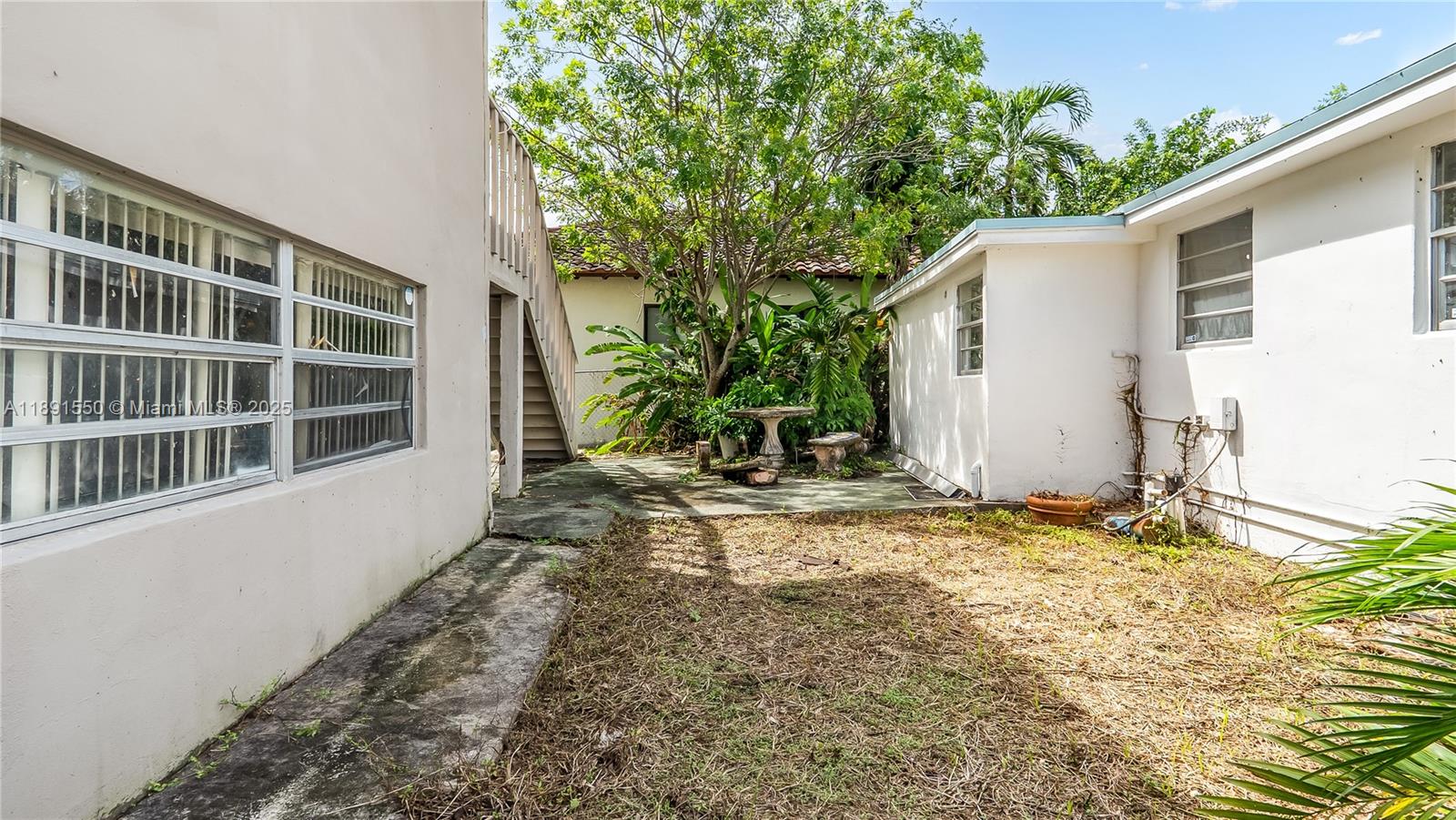 2100 Southwest 25th Street Miami, FL 33133 - Photo 12 of 23 a view of a house with a yard