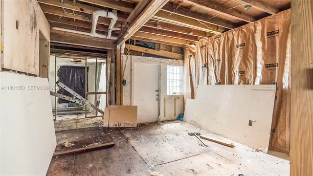 a view of a porch with wooden floor and stairs