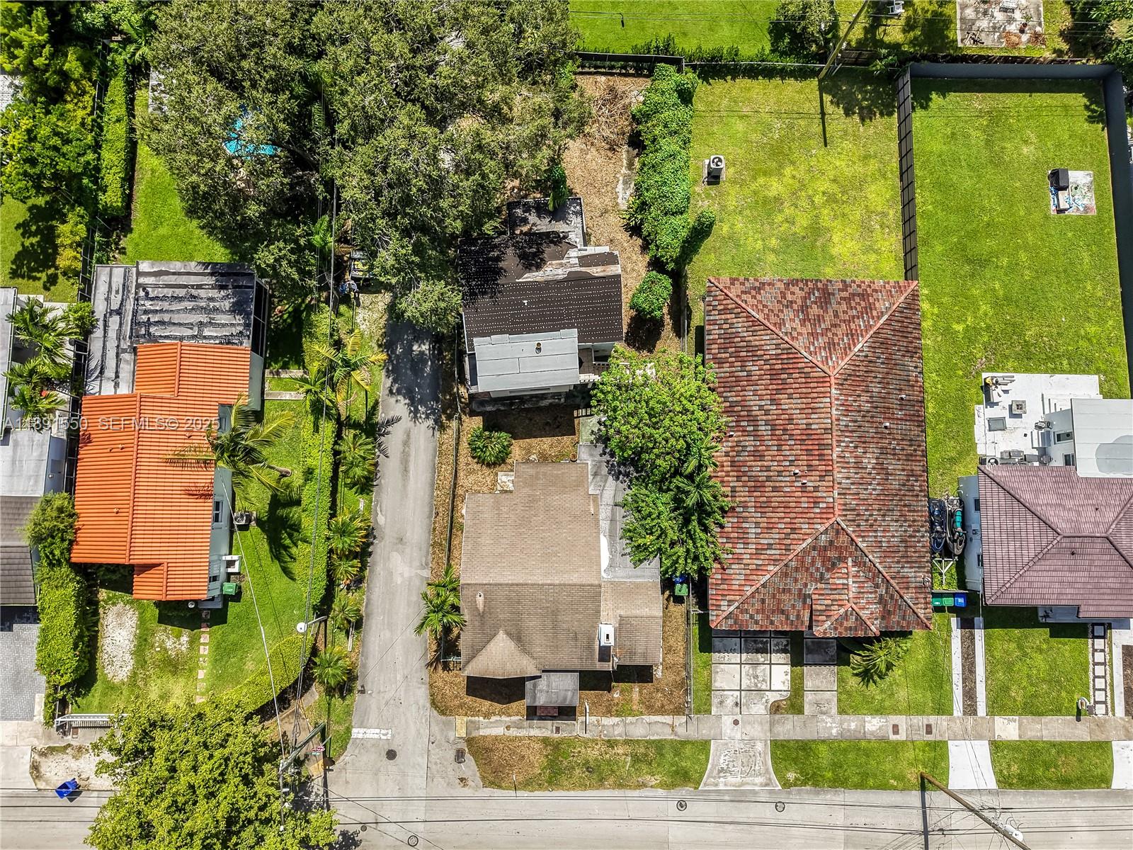 2100 Southwest 25th Street Miami, FL 33133 - Photo 5 of 23 an aerial view of houses with yard