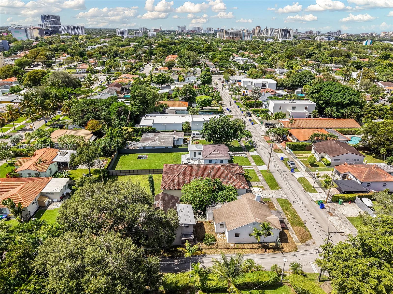 2100 Southwest 25th Street Miami, FL 33133 - Photo 6 of 23 an aerial view of residential houses with outdoor space and parking