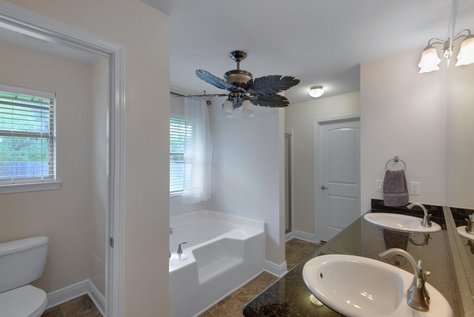 2383 Crescent Road Navarre, FL 32566 - Photo 19 of 48 a bathroom with a sink and a mirror