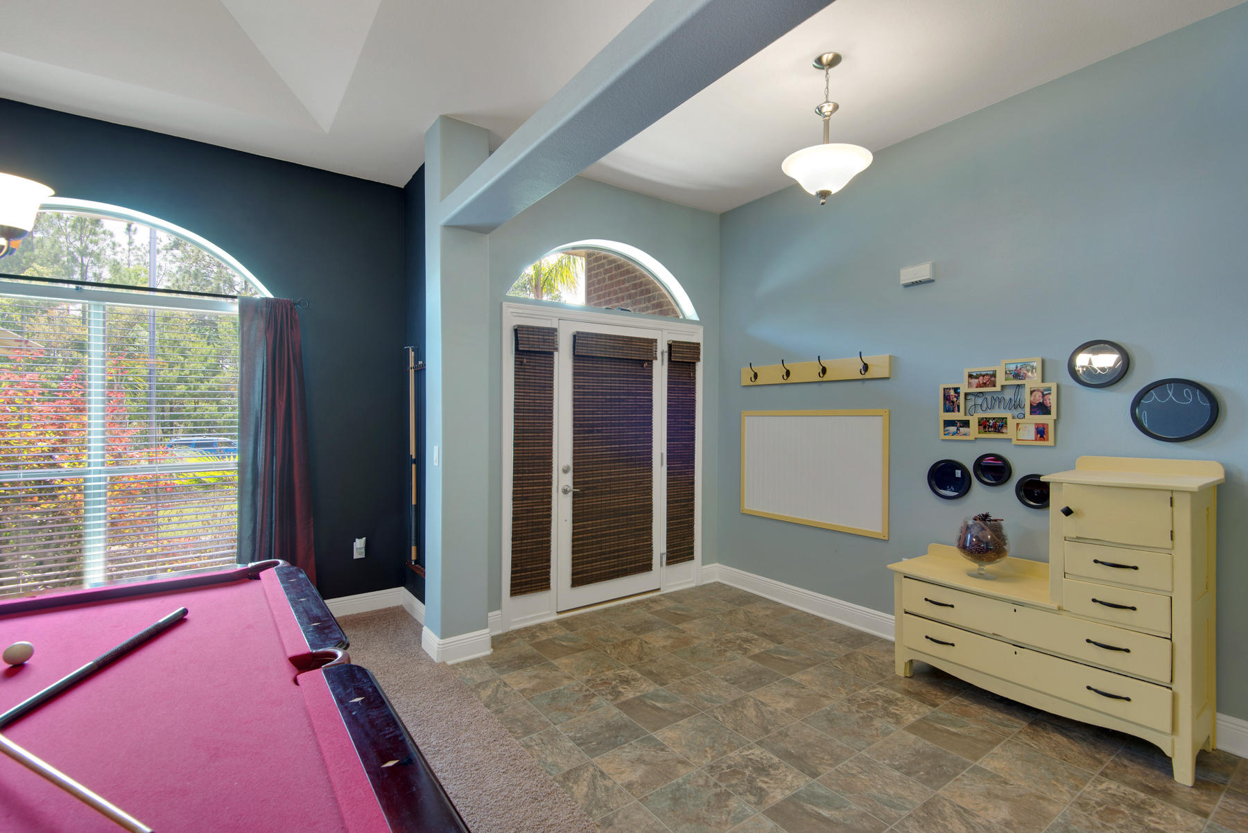 2383 Crescent Road Navarre, FL 32566 - Photo 3 of 48 a bedroom with a bed and a window