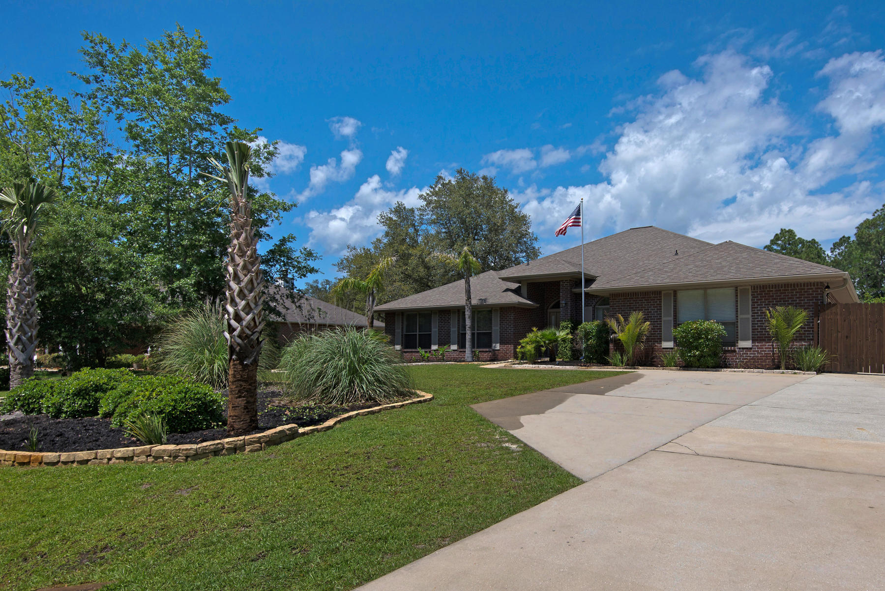 2383 Crescent Road Navarre, FL 32566 - Photo 34 of 48 a view of a house with a yard