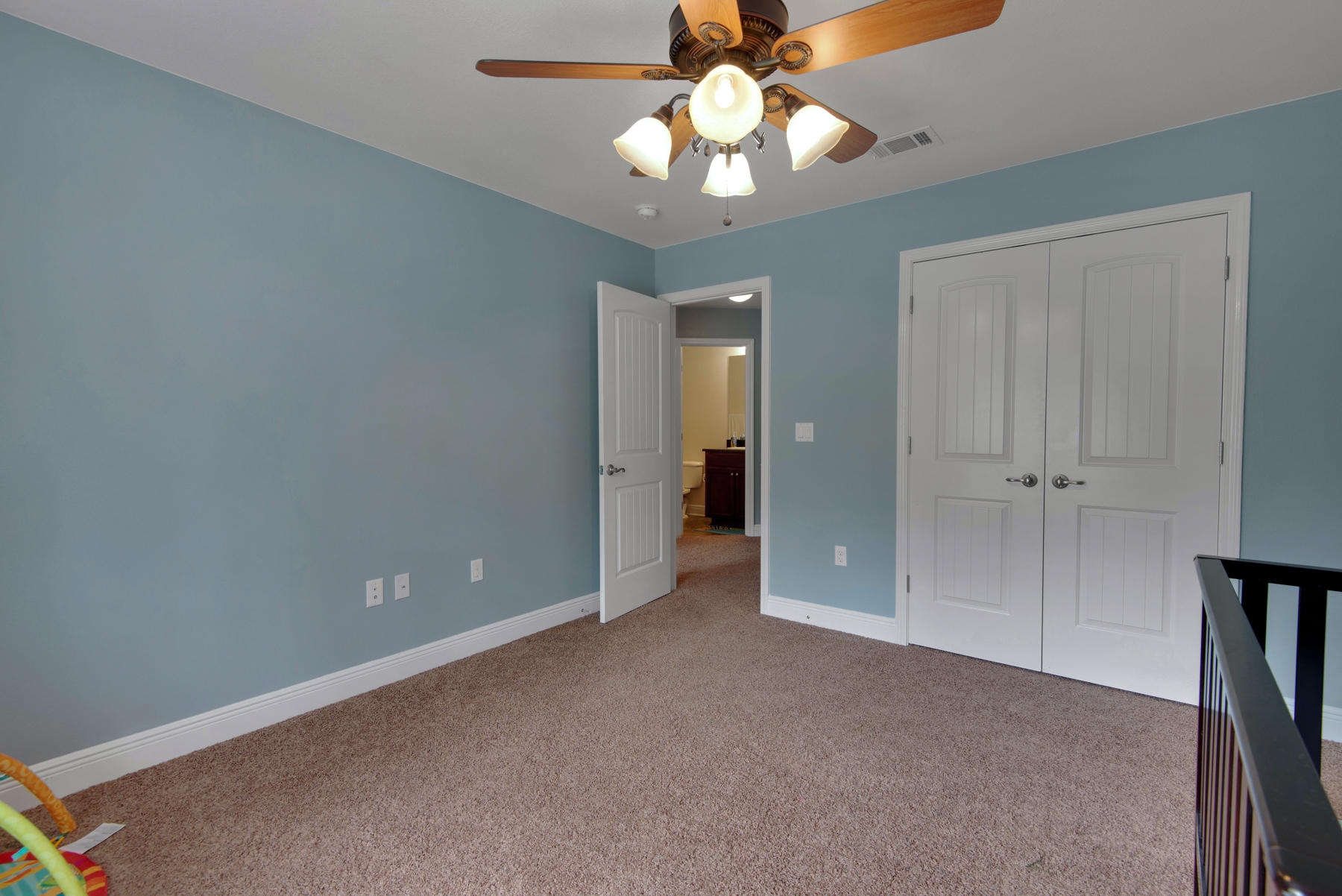 2383 Crescent Road Navarre, FL 32566 - Photo 40 of 48 an empty room with closet and a chandelier fan