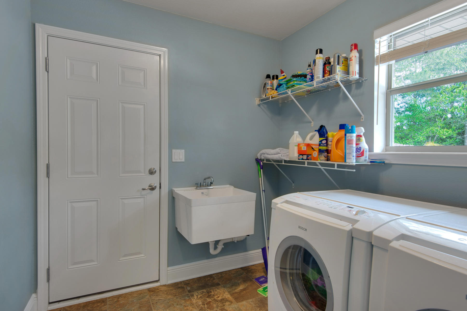 2383 Crescent Road Navarre, FL 32566 - Photo 45 of 48 a utility room with dryer and washer