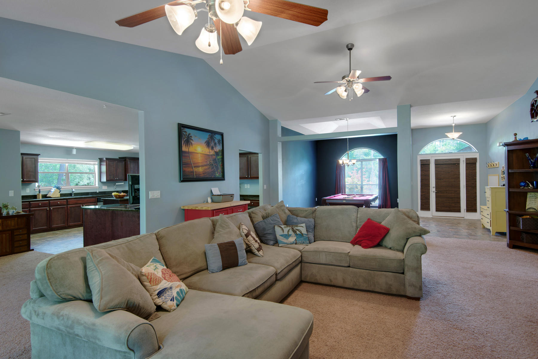 2383 Crescent Road Navarre, FL 32566 - Photo 8 of 48 a living room with furniture and a flat screen tv