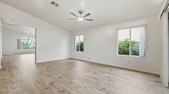 a kitchen with stainless steel appliances a refrigerator and a sink