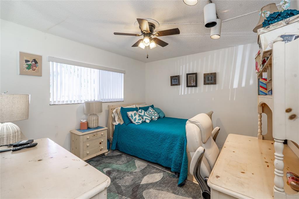 3601 Inverrary Drive, Unit 107 Lauderhill, FL 33319 - Photo 14 of 25 a living room with furniture