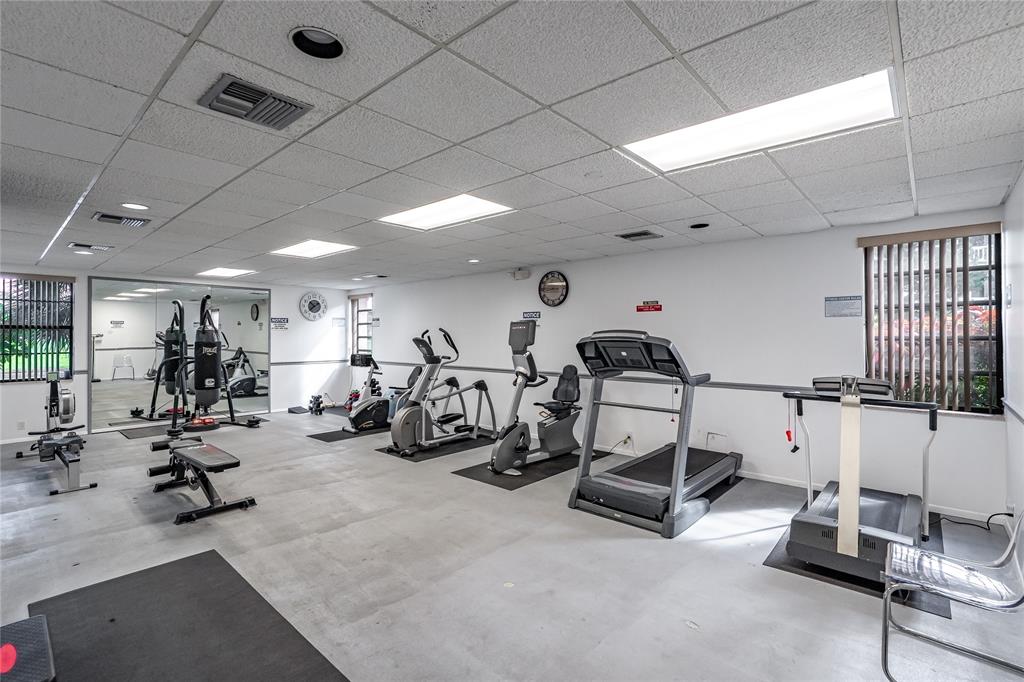 3601 Inverrary Drive, Unit 107 Lauderhill, FL 33319 - Photo 22 of 25 a view of a room with gym equipment