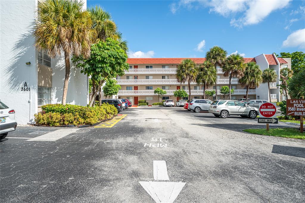 3601 Inverrary Drive, Unit 107 Lauderhill, FL 33319 - Photo 25 of 25 a view of street with parked cars