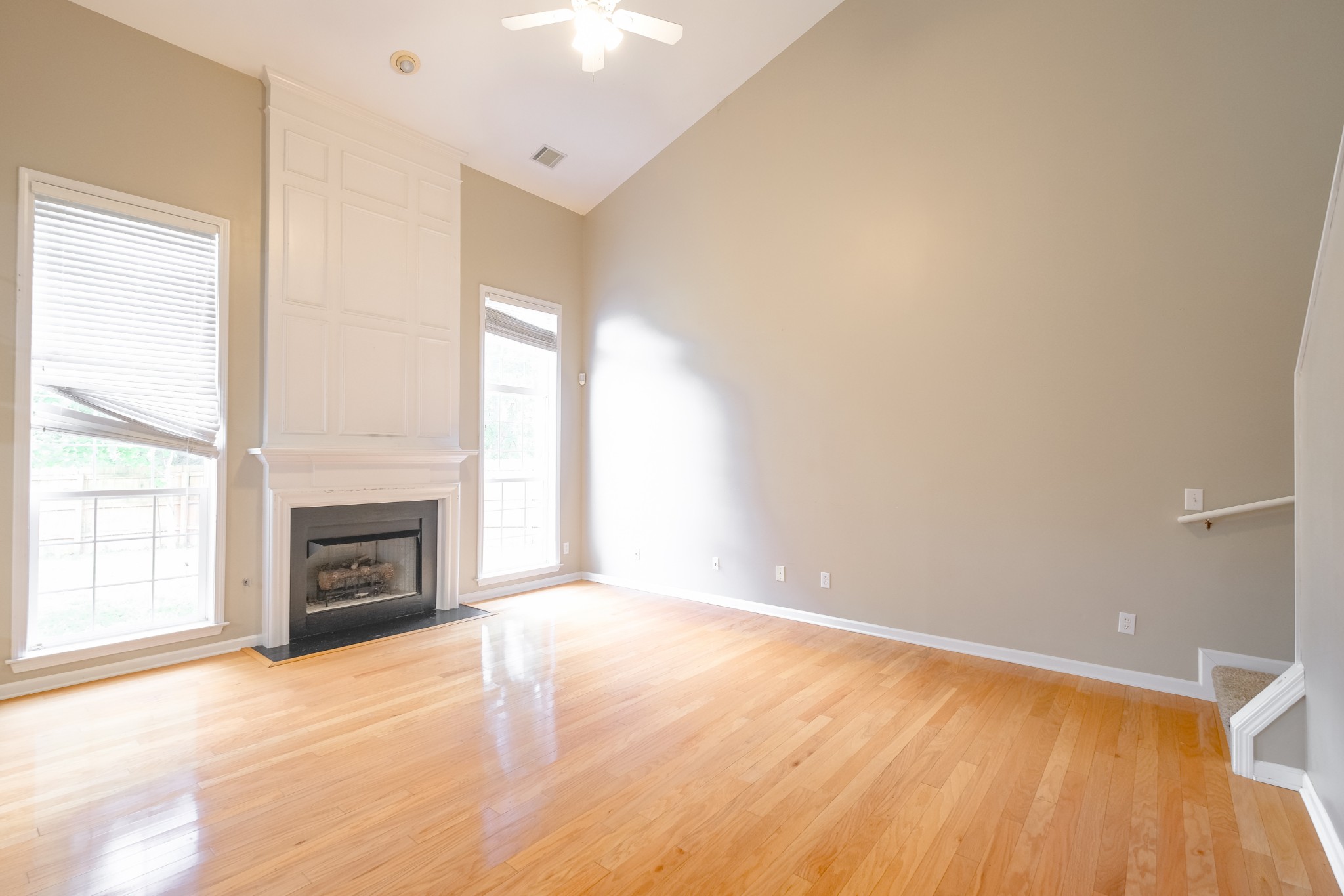 130 Stanwick Drive Franklin, TN 37067 - Photo 13 of 37 wooden floor fireplace and windows in a room