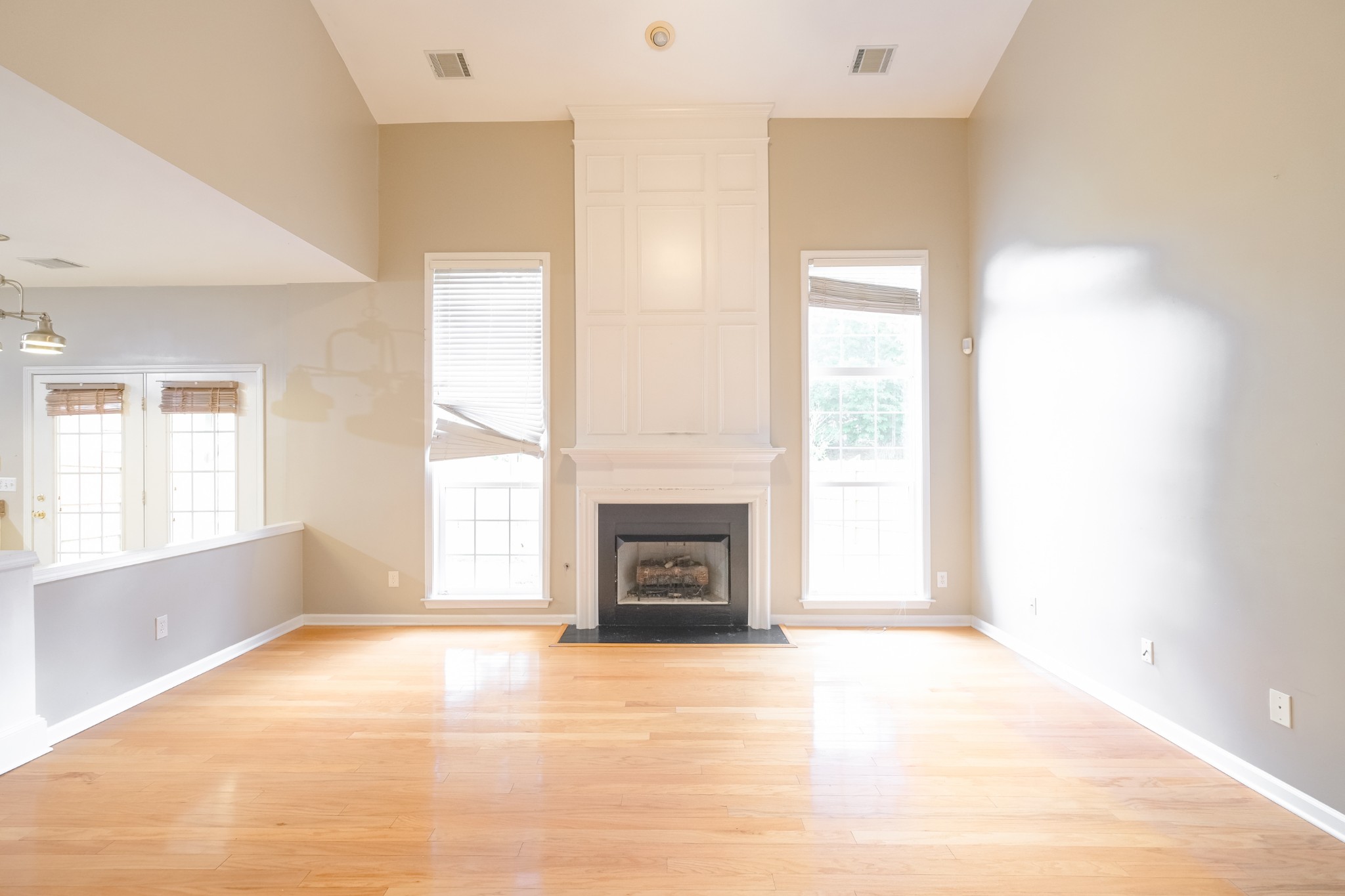 130 Stanwick Drive Franklin, TN 37067 - Photo 14 of 37 a view of an empty room with a window and a fireplace