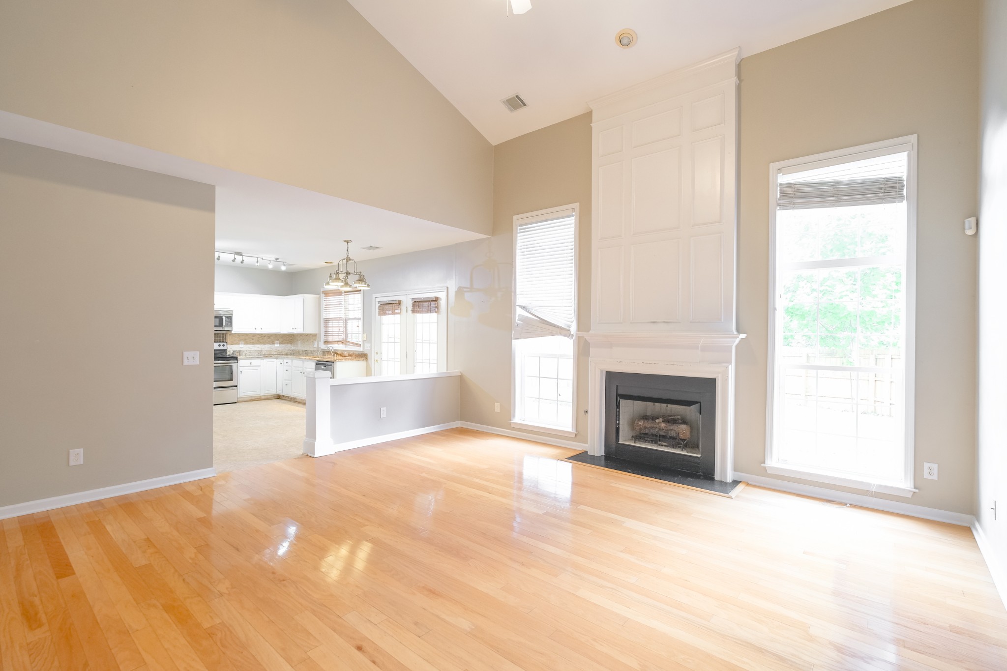 130 Stanwick Drive Franklin, TN 37067 - Photo 15 of 37 a view of a kitchen with a sink and a fireplace