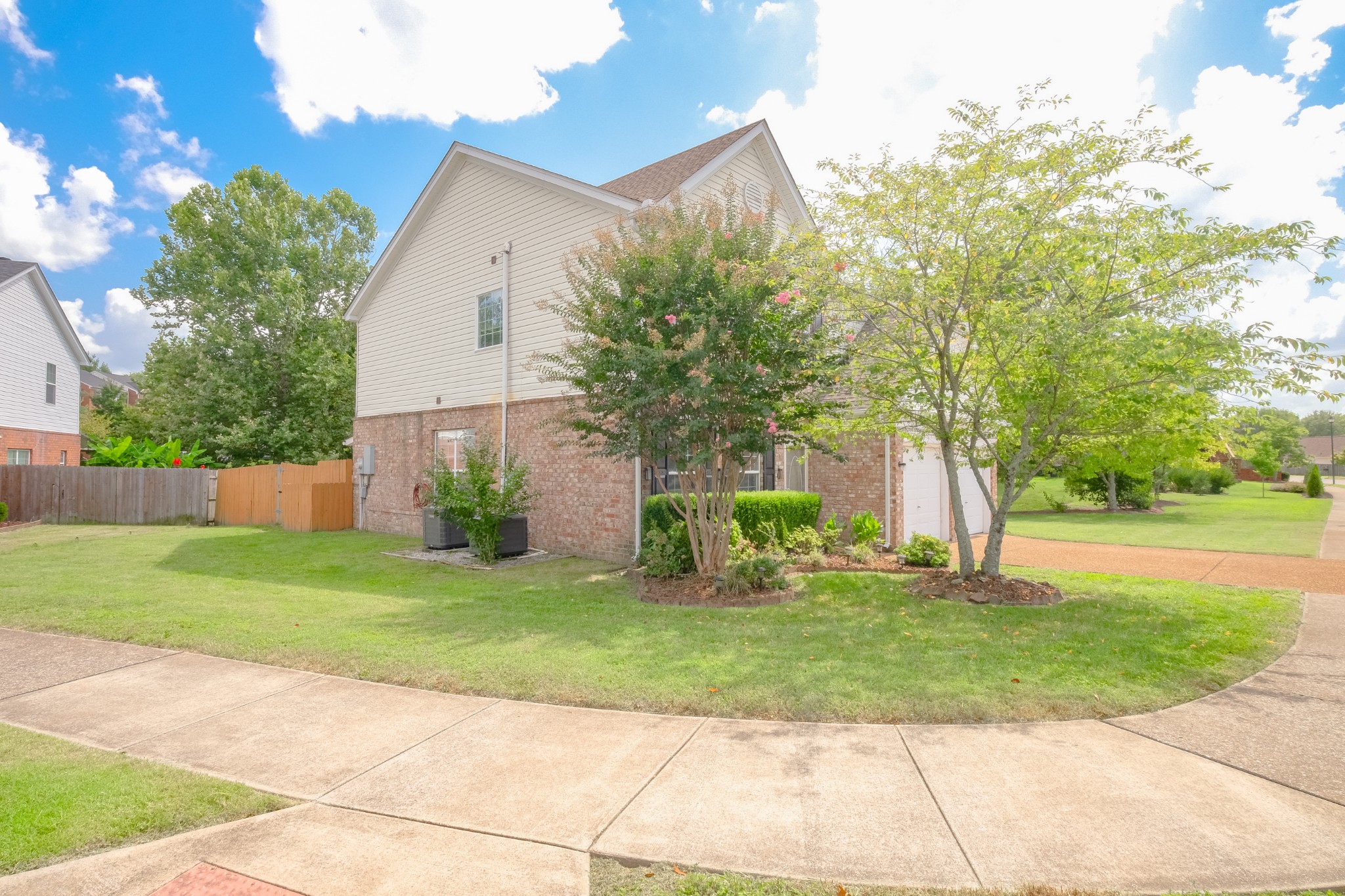130 Stanwick Drive Franklin, TN 37067 - Photo 3 of 37 a front view of a house with a yard and trees