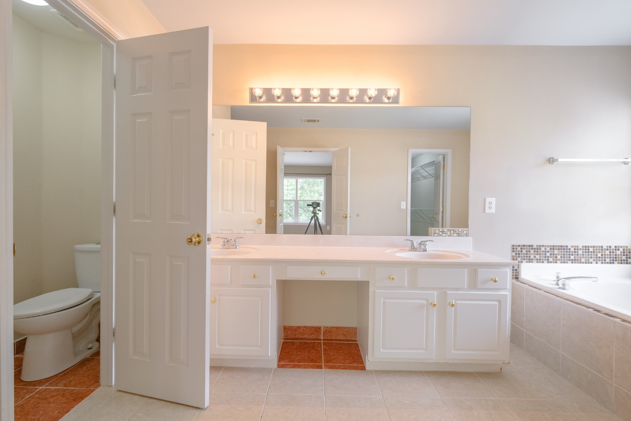 130 Stanwick Drive Franklin, TN 37067 - Photo 21 of 37 a bathroom with a sink a toilet and a mirror