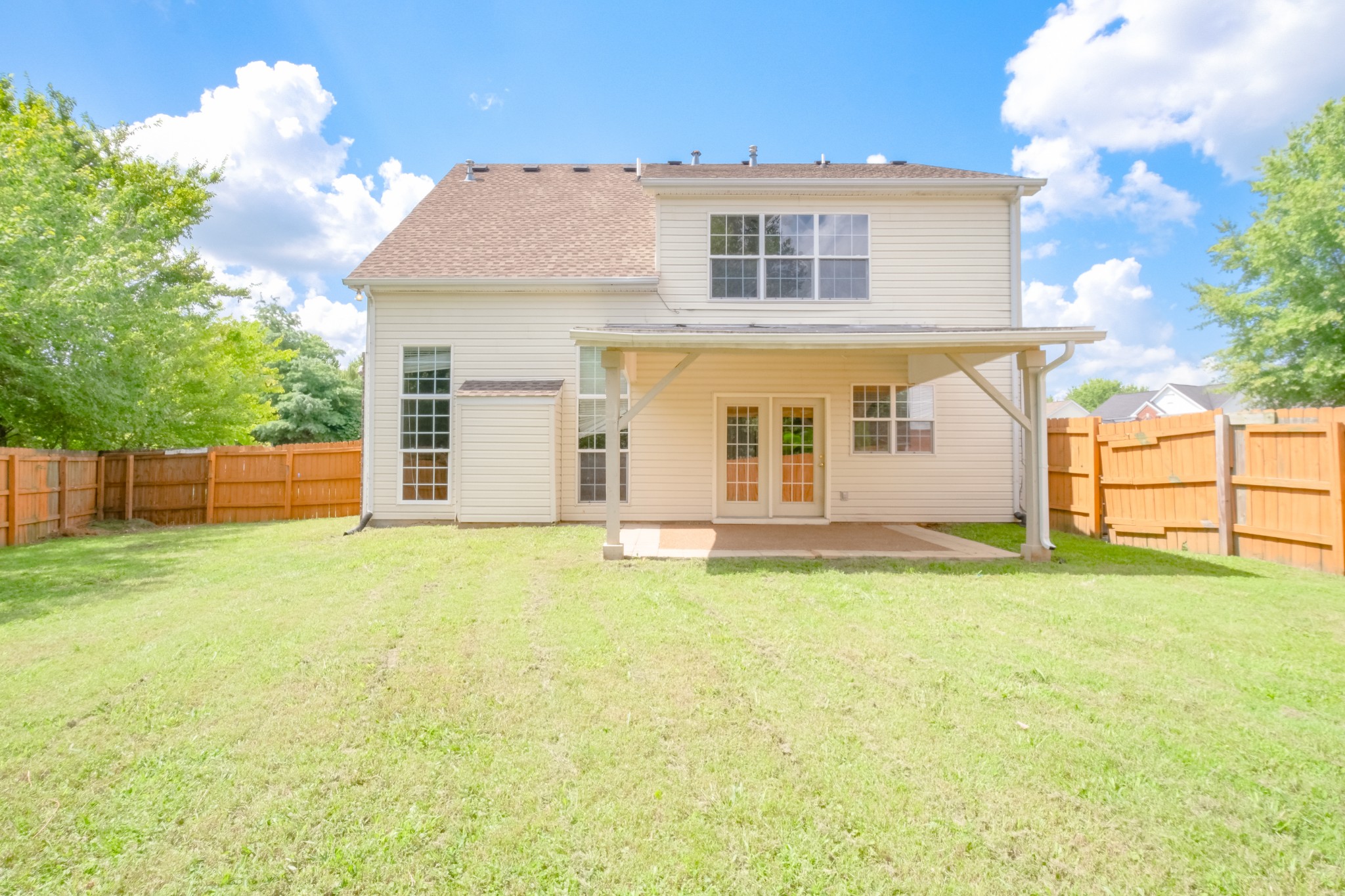 130 Stanwick Drive Franklin, TN 37067 - Photo 36 of 37 a view of a house with backyard and wooden fence