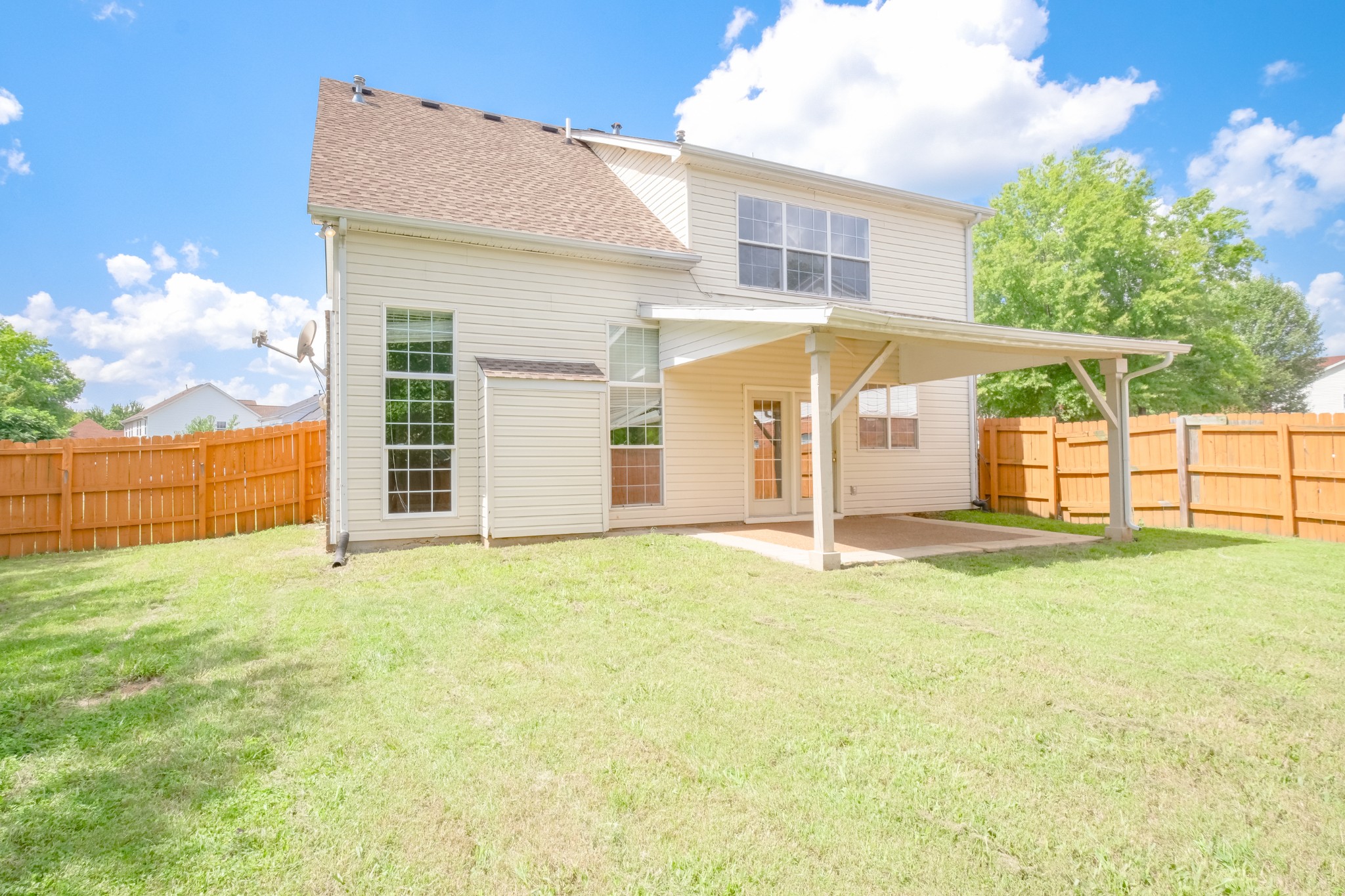 130 Stanwick Drive Franklin, TN 37067 - Photo 37 of 37 a view of a house with backyard and wooden fence