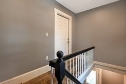 204 Elm Street Amesbury, MA 01913 - Photo 14 of 28 a view of a hallway with staircase