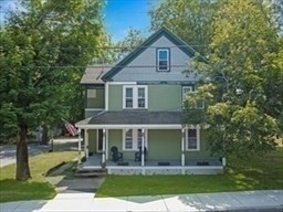 204 Elm Street Amesbury, MA 01913 - Photo 28 of 28 a front view of a house with a yard