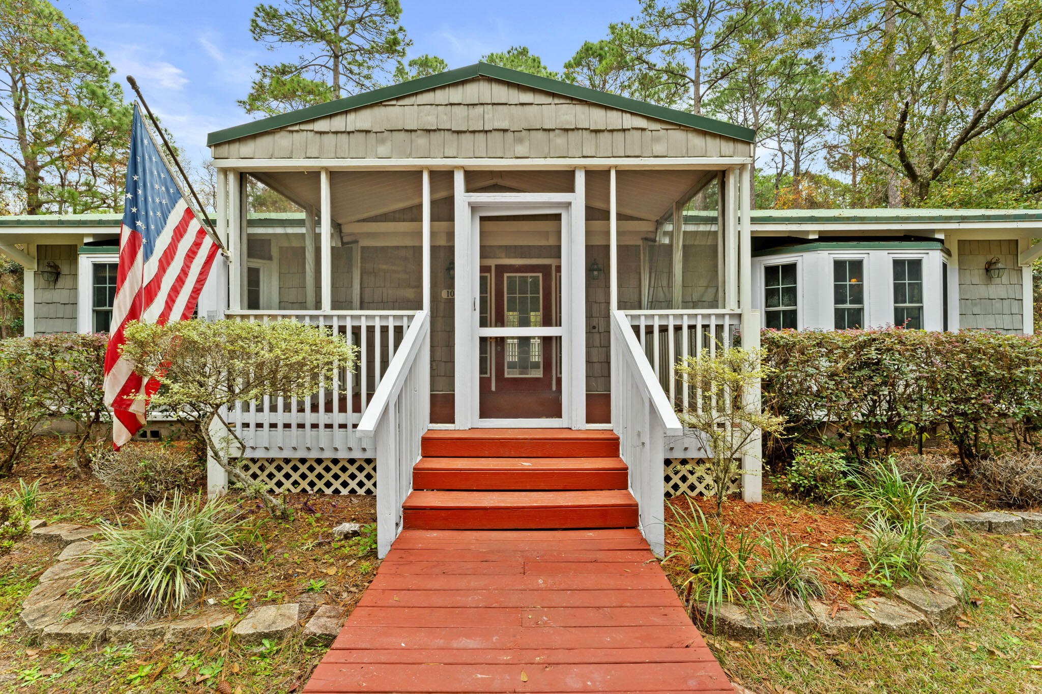 a front view of a house with a porch