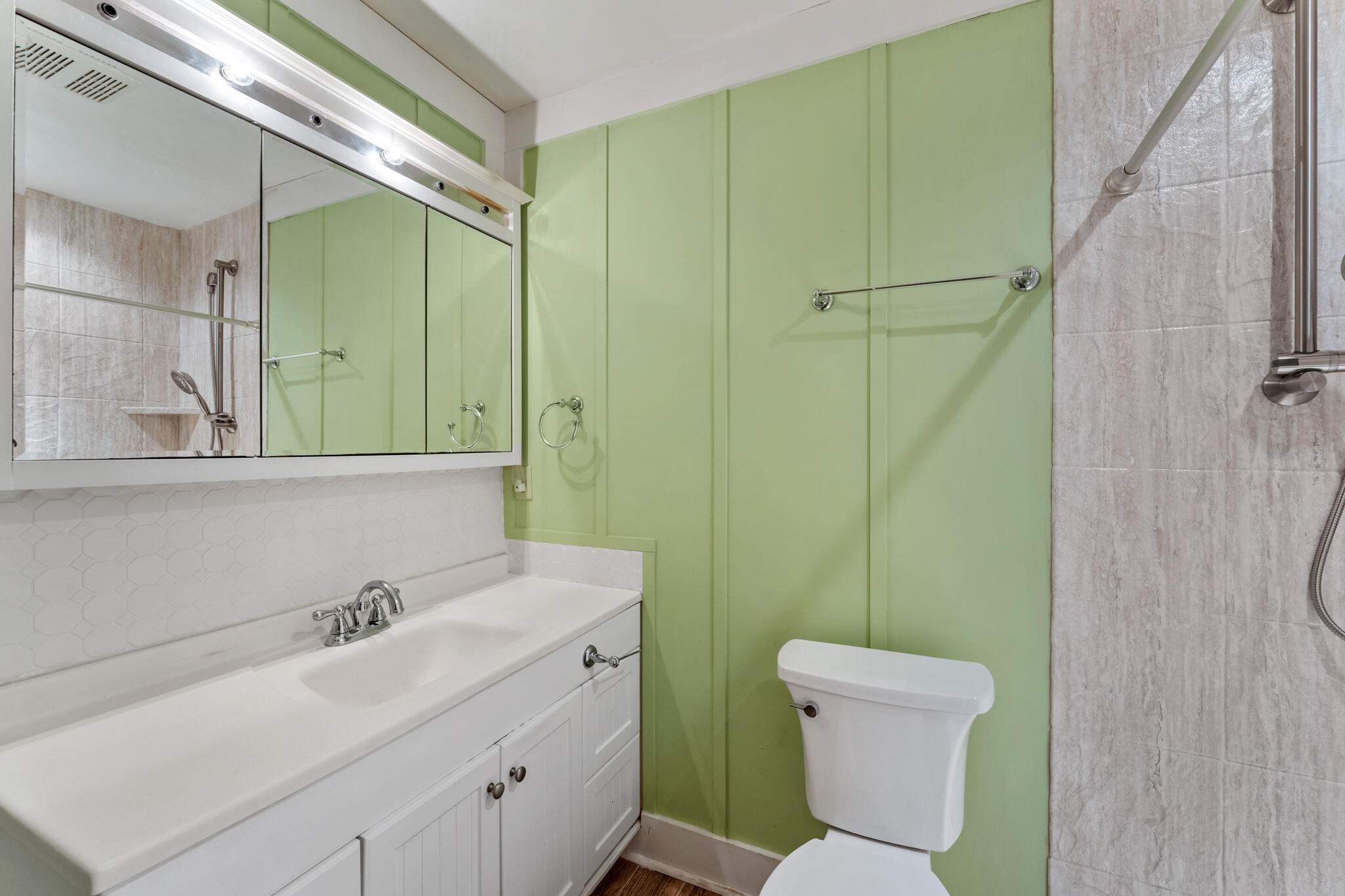 108 Osprey Lane Santa Rosa Beach, FL 32459 - Photo 20 of 40 a bathroom with a toilet sink and mirror