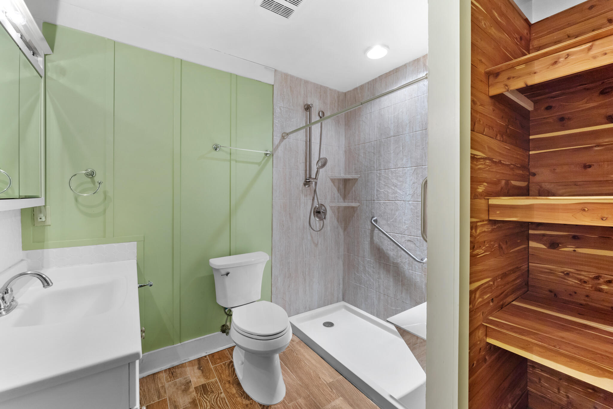 108 Osprey Lane Santa Rosa Beach, FL 32459 - Photo 21 of 40 a bathroom with a toilet a sink and shower